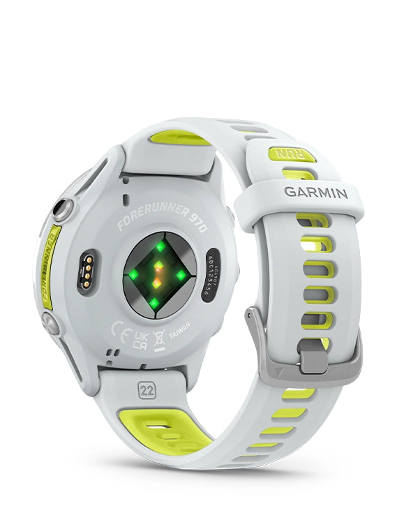 Garmin Forerunner 935 smartwatch with white and lime green band on a white background